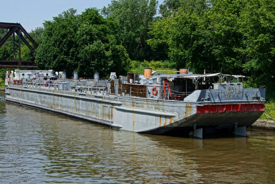 grey canal ship on the water
