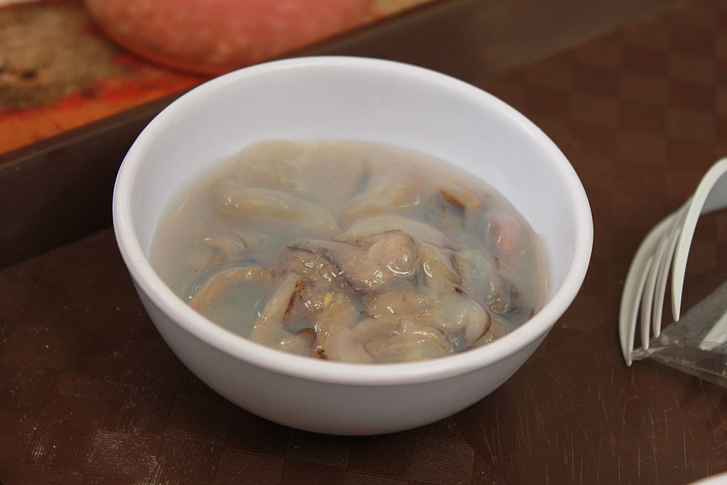 soup bowl filled with shipworms and broth
