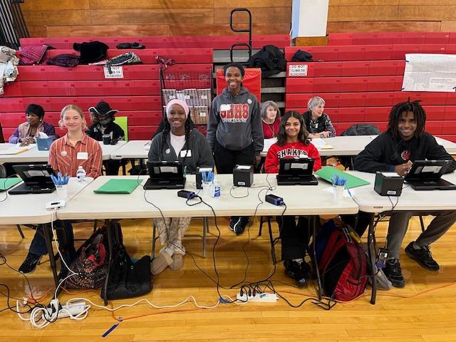 SHHS students pose for a picture while working at a polling location.