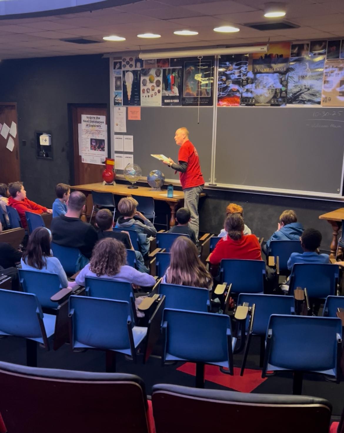 Mr. Childs speaks to Mrs. Brindza's class of Fernway fourth-grade students in the planetarium at SHHS.