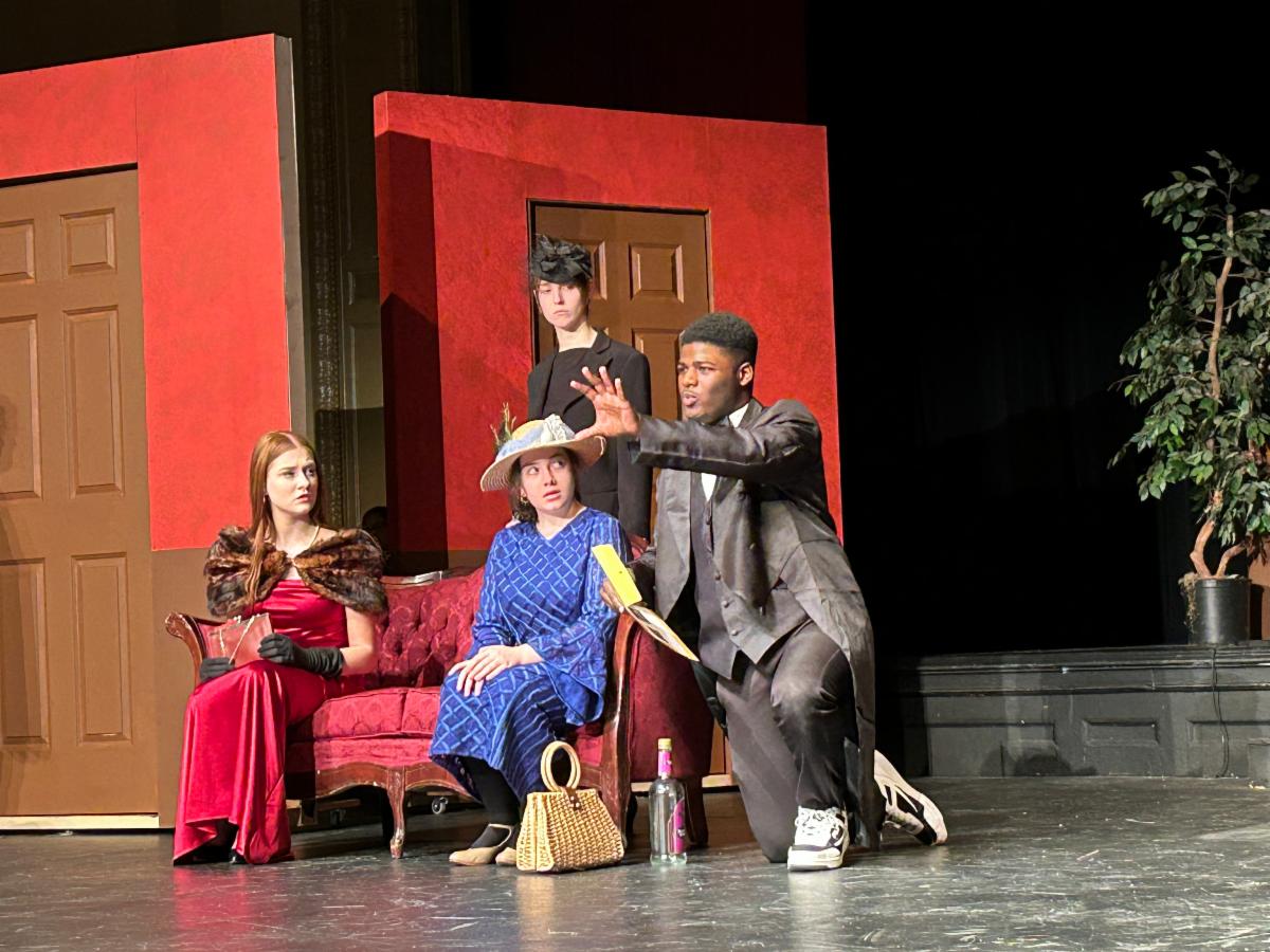 This image is a scene from Clue, performed by Shaker Heights High School students.