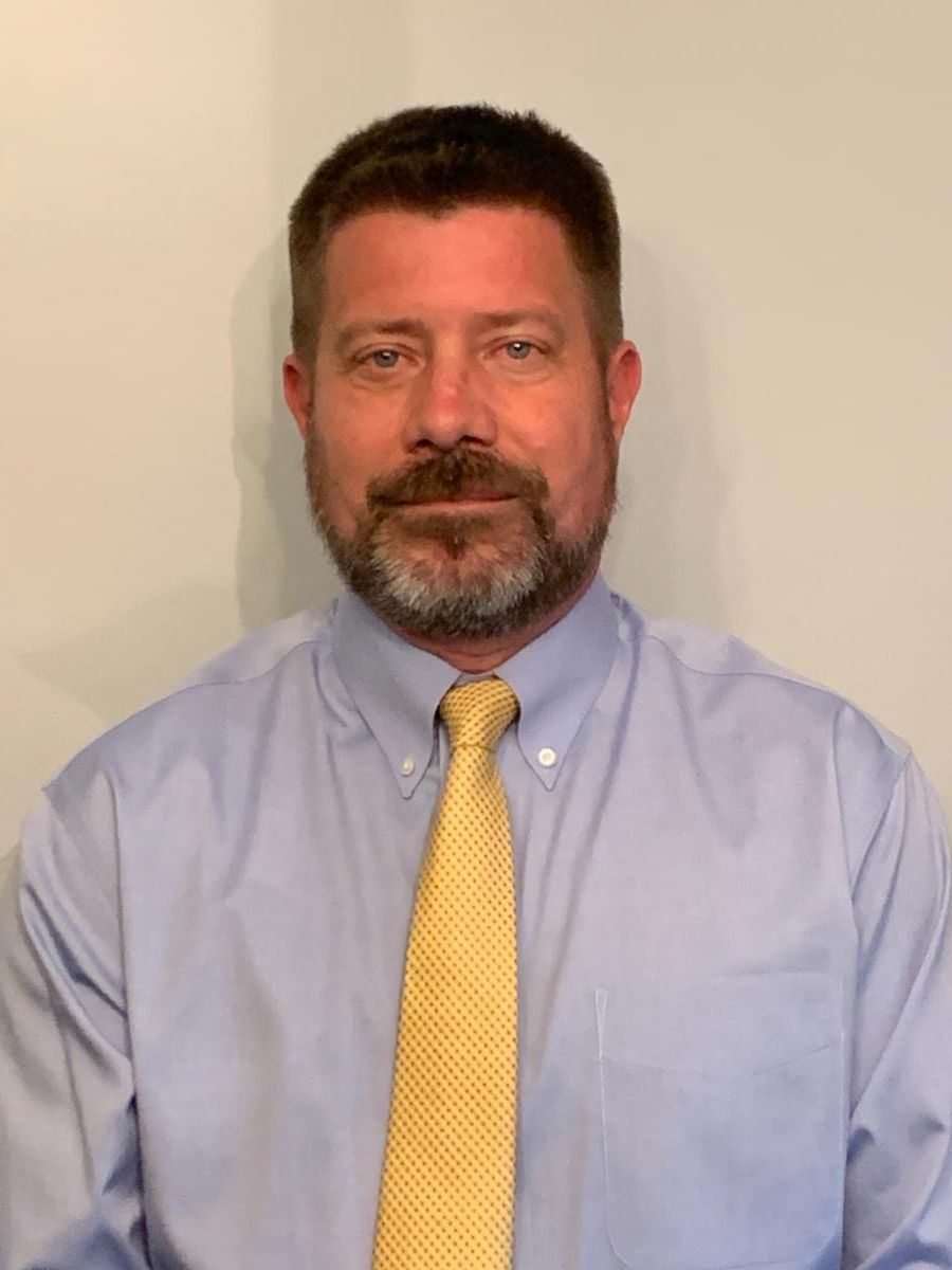 Headshot of SHHS Swim Coach Eric Peterson.