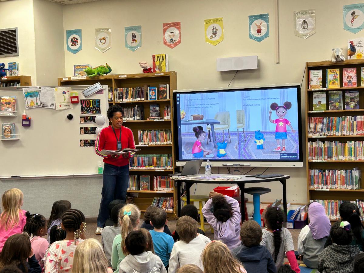 Author Clothilde Ewing reads her book to Boulevard students in the library.