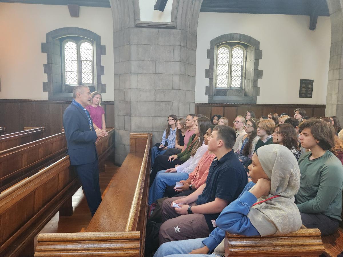 Ethics Award Winner Oscar Chacon speaks to Shaker students.