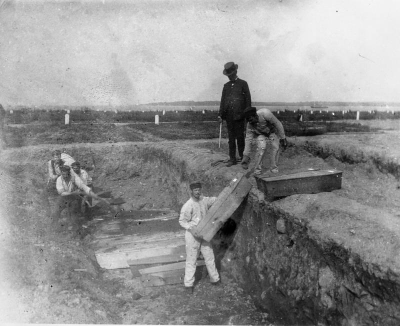 Prisoners Burying Bodies in 1890