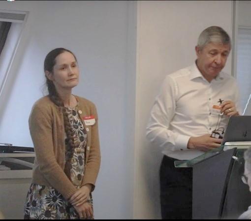Fiona McRonald and Sir John Burn delivering a presentation at the Lynch Syndrome UK patient conference March 2022 