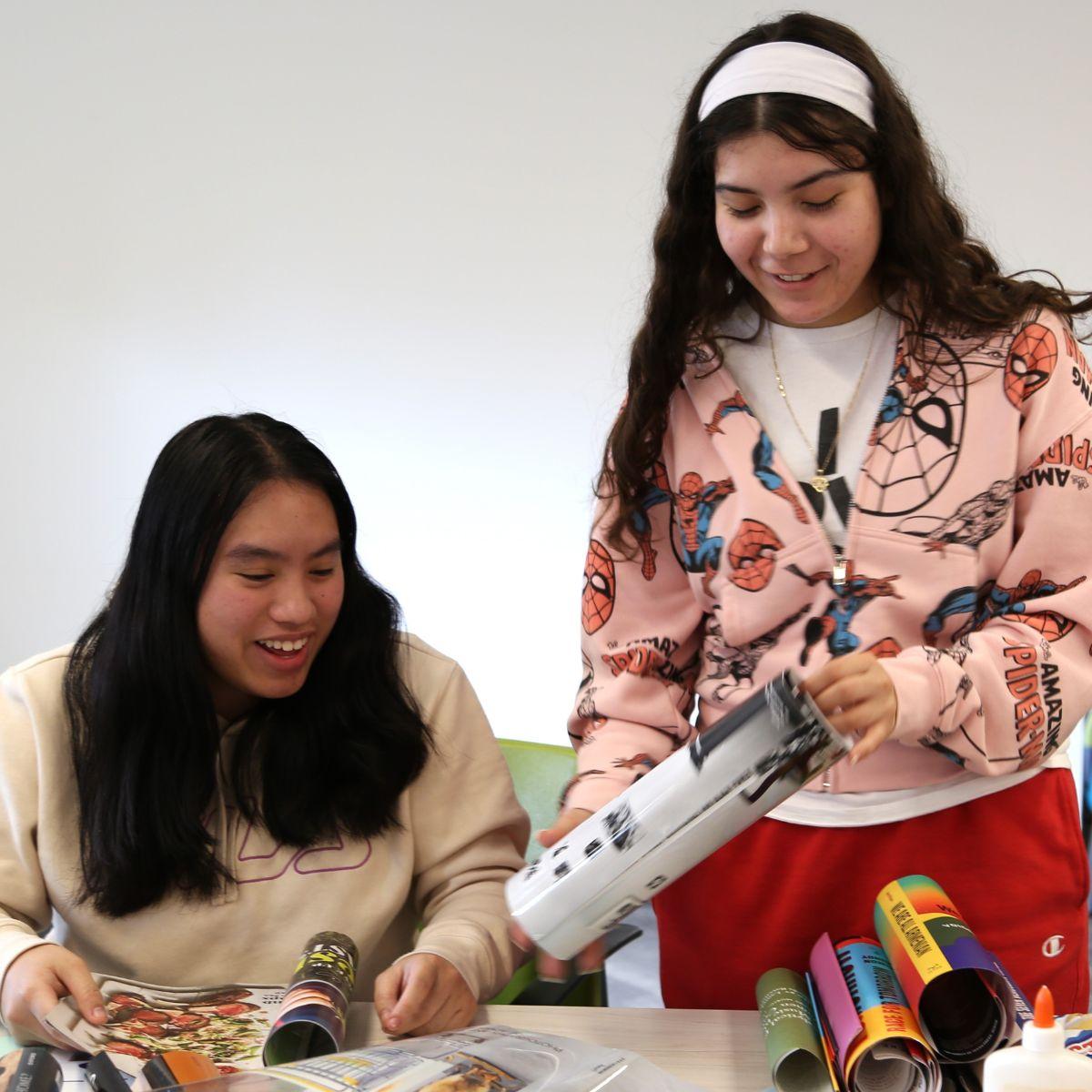 UC Irvine students creating collages.