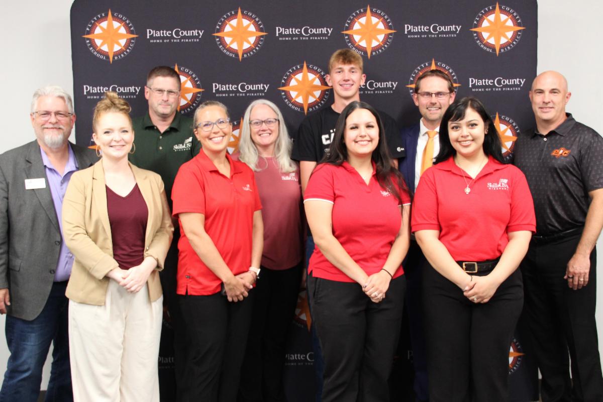 Students and Staff posing for a photo