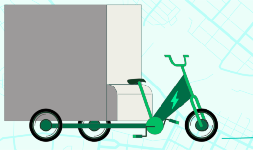 Area that is part of the Chelsea Everett Greenway Connector project. An asphalt road with a large brick building on the left. On the right are newer constructed apartment buildings. The road is leading to a large parking garage.