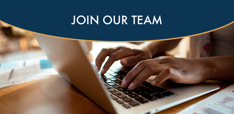 White text over a blue background says Join Our Team. Under the text is aphoto of hands typing on a laptop.