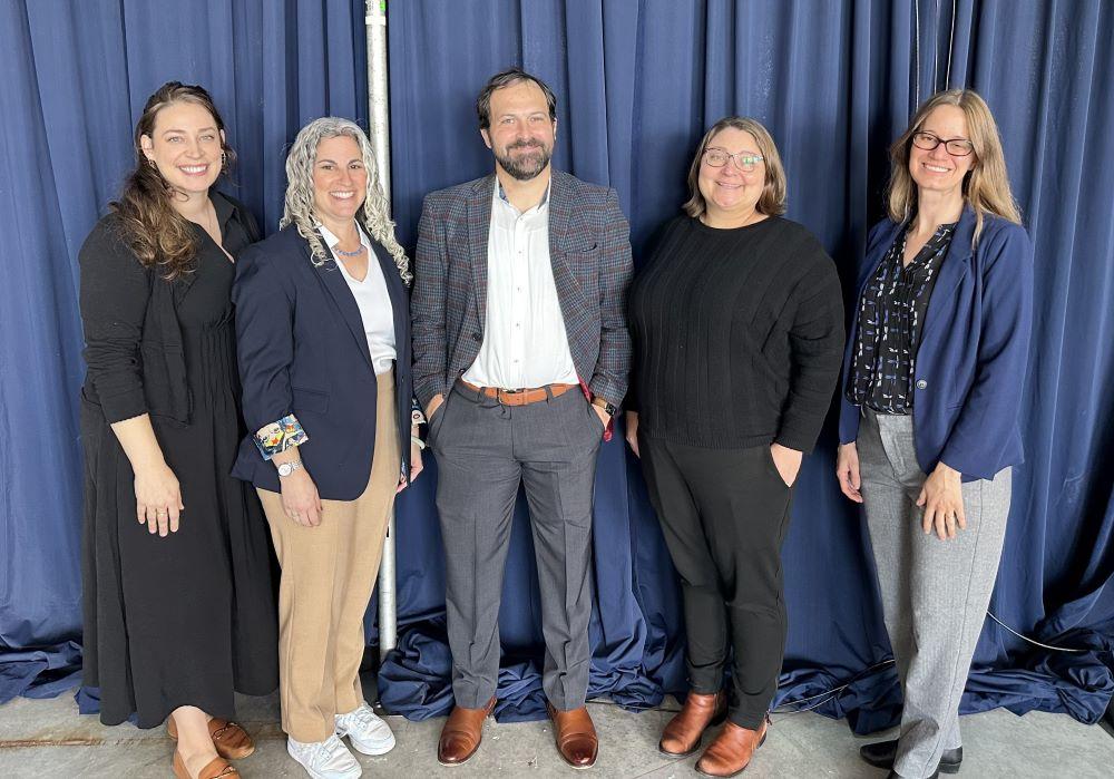 Left to right Kat Kobylt Senior Environmental Planner Lizzi Weyant Executive Director Norman Abbott Senior Government Affairs Specialist Sasha Shyduroff-Gutman Principal Planner and Julie Curti Director of Clean Energy.