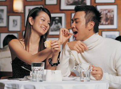 couple-feeding-eachother.jpg