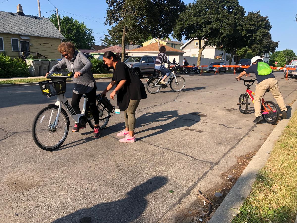 Residents riding bikes