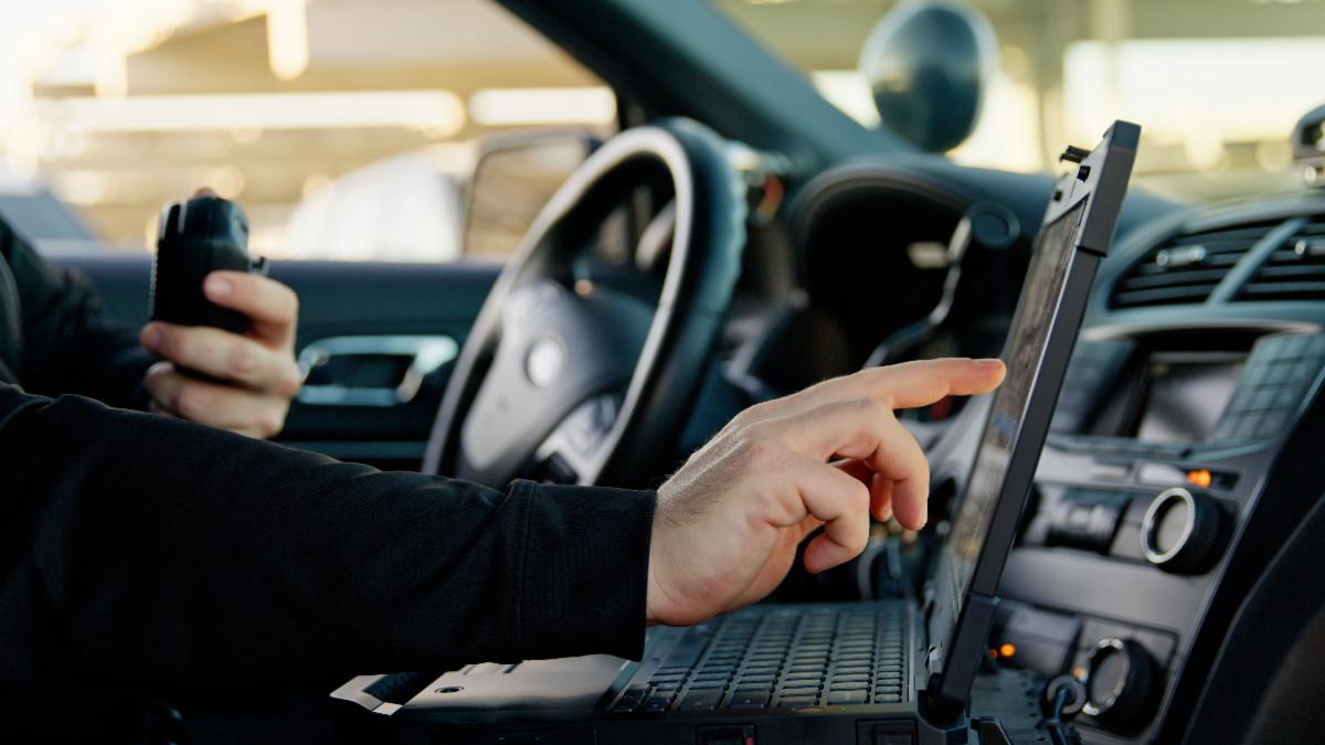 police officer on laptop