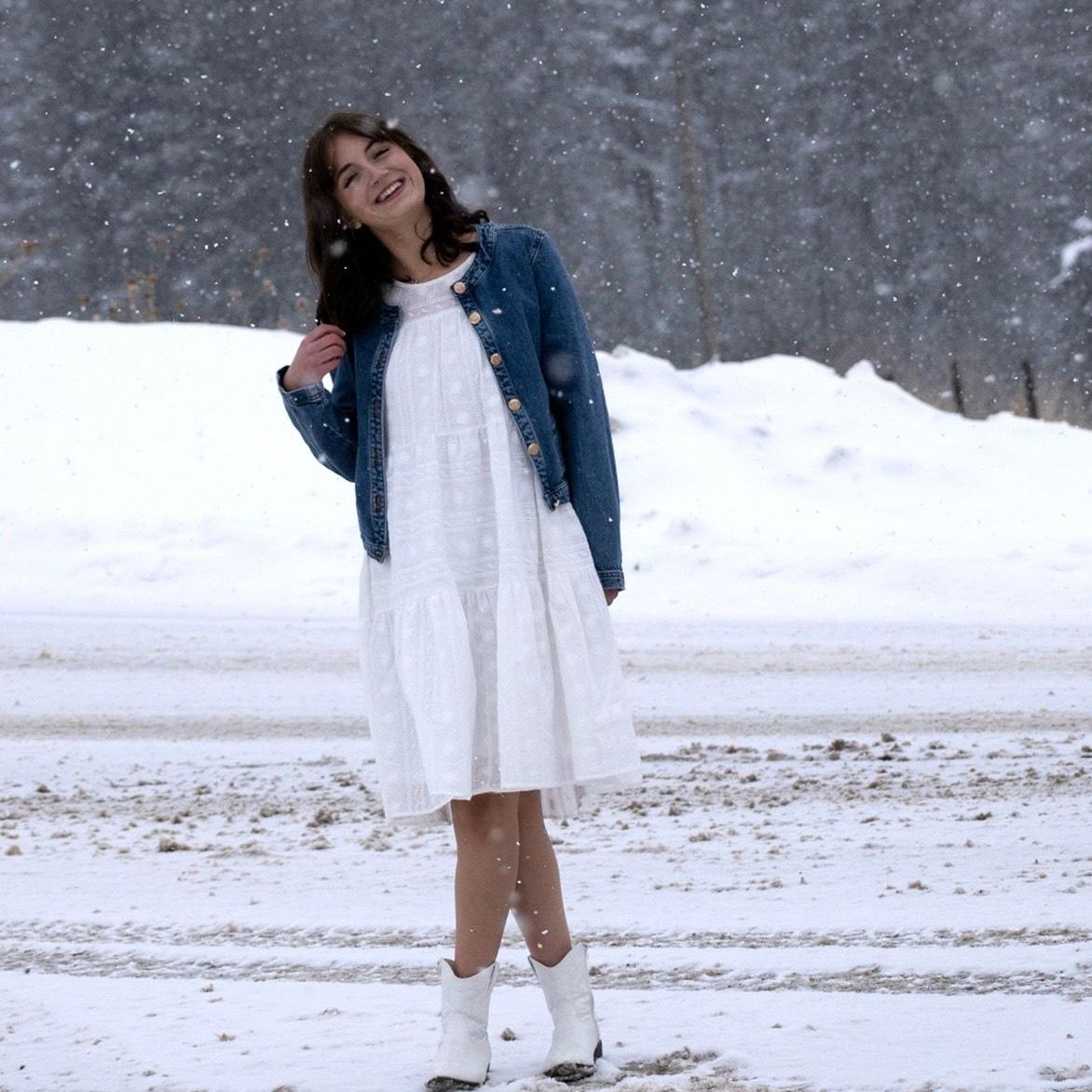 Evalynn standing outside in the snow