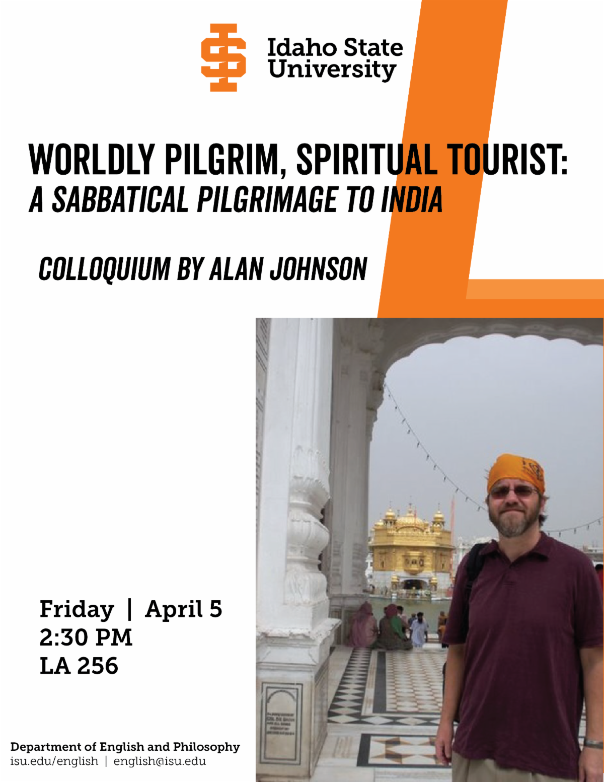 Alan Johnson has an orange scarf tied around his head. He stands outside with a stone pillar behind him.