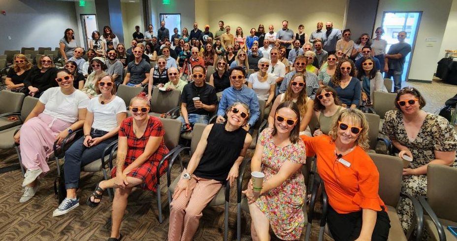 faculty and staff of college in a group photo