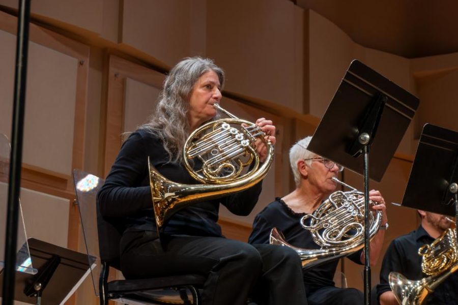 Woman playing a brass instrument during a Civic Band performance