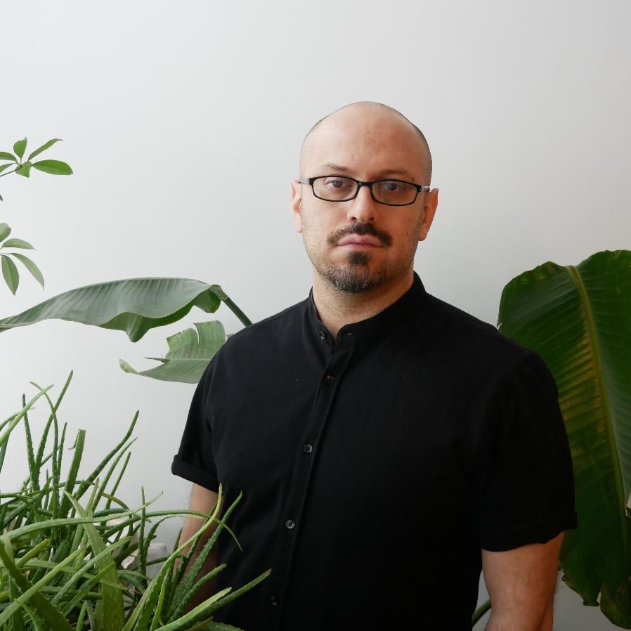 headshot of Benavides