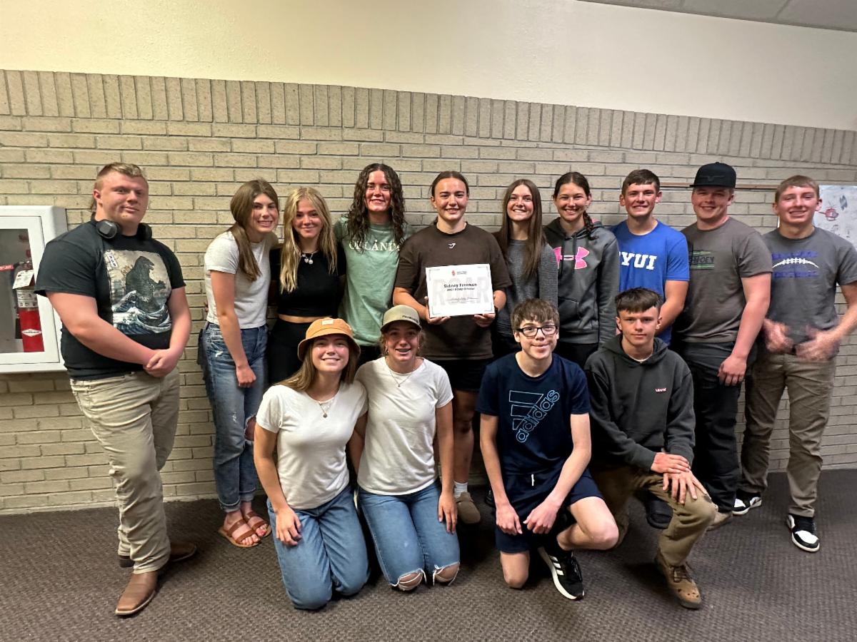 Scholarship winner from Rockland surrounded by students