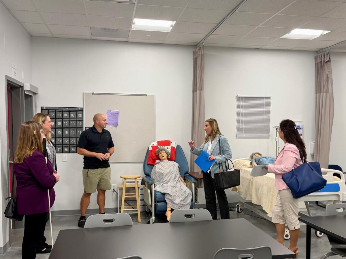DOL, Iowa Dept of Ed, and EIWB staff in the healthcare lab at the Regional Innovation Center