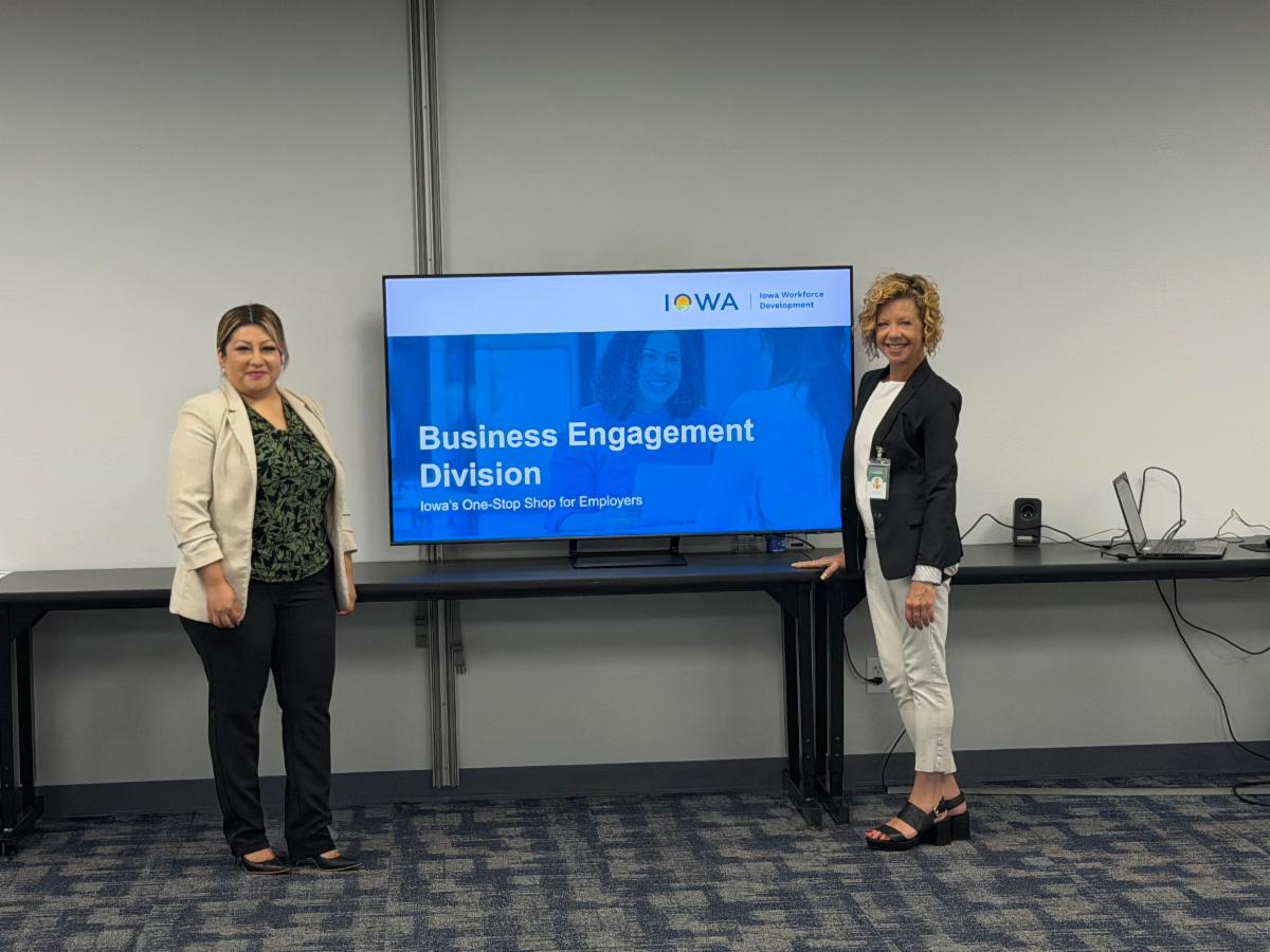 Business Engagement staff with presentation