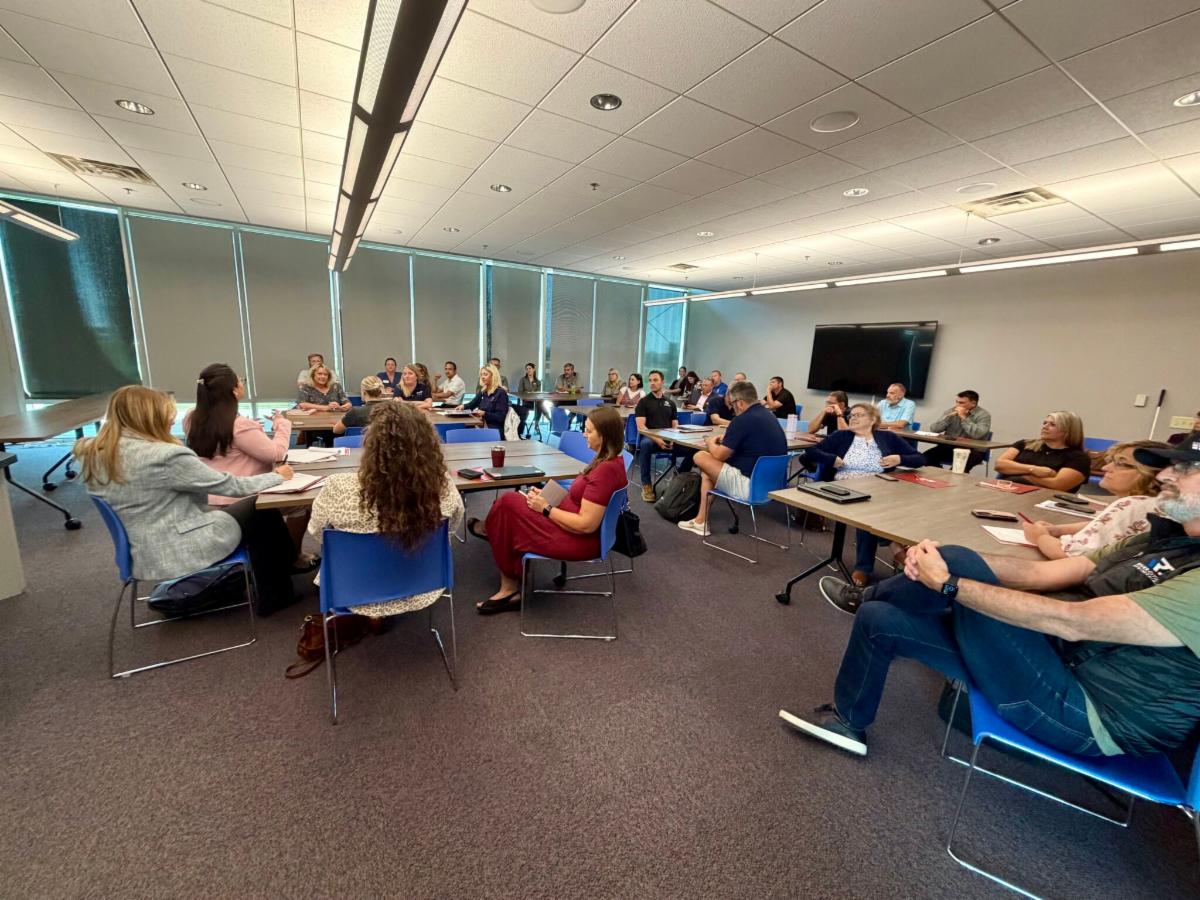 Workforce, labor, education, and industry representatives participating at the roundtable discussion.
