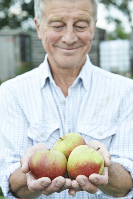 senior_holding_apples.jpg