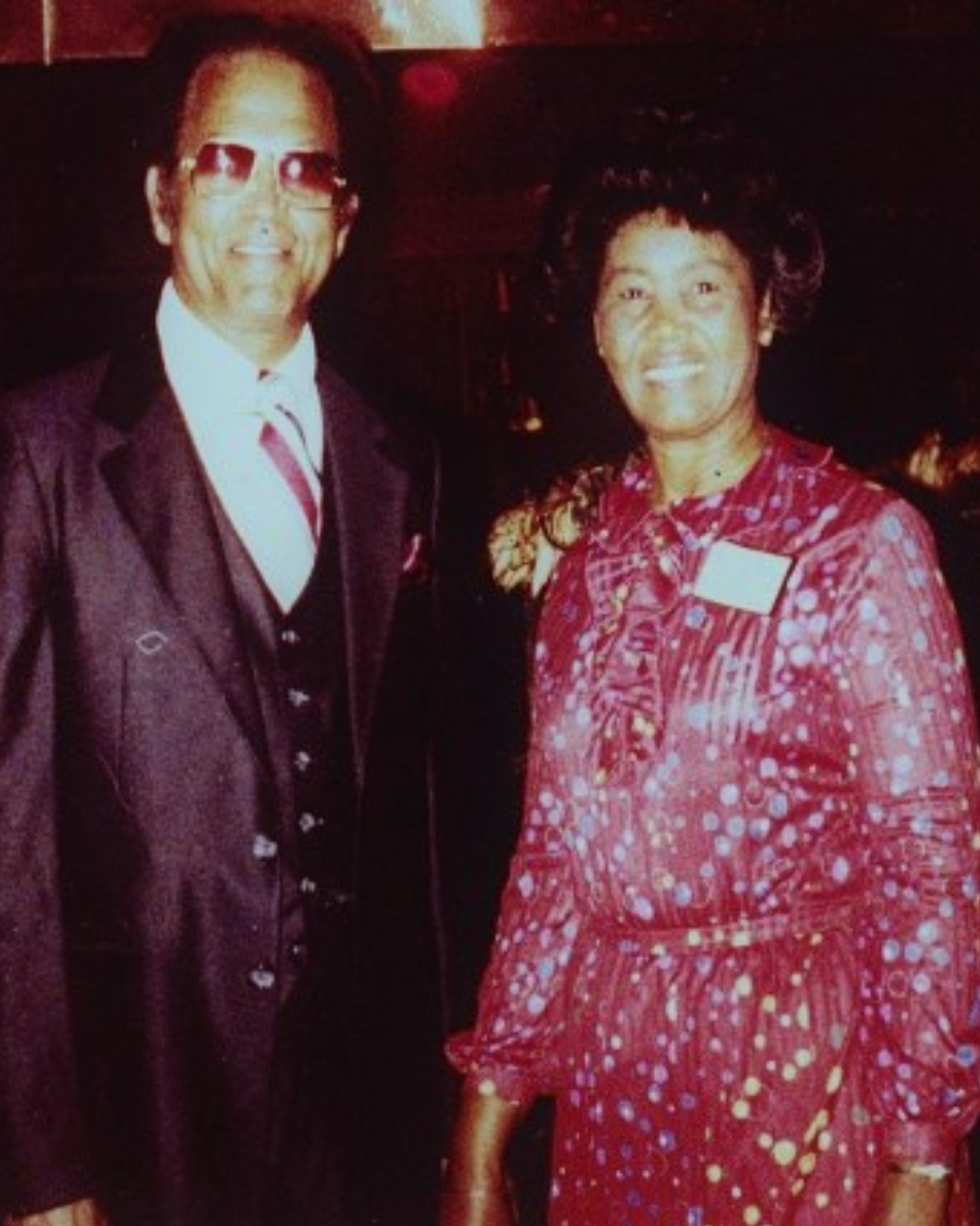Jewel Collins standing next to her husband Leon Collins