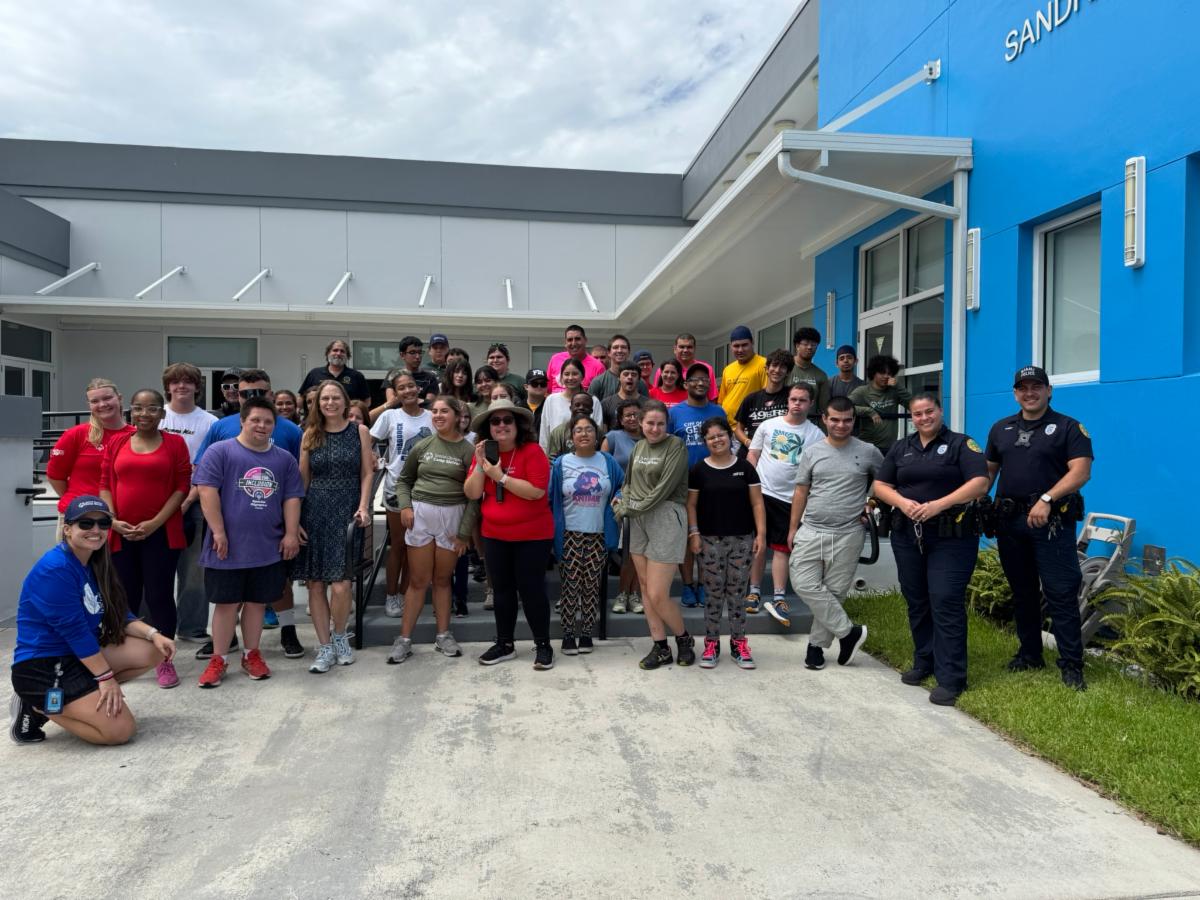 Photo of Debbie at a Wallet Card training with police and young adults