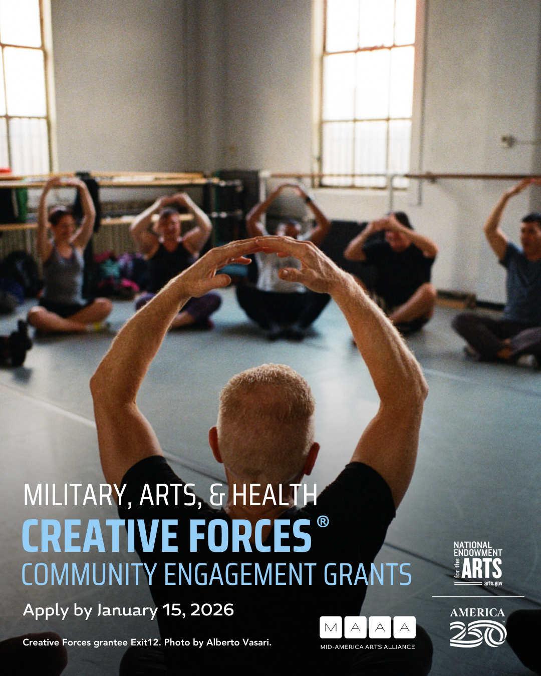 A circle of people stretching their arms up behind graphic text