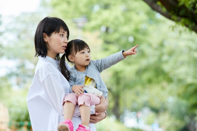 child pointing at an object