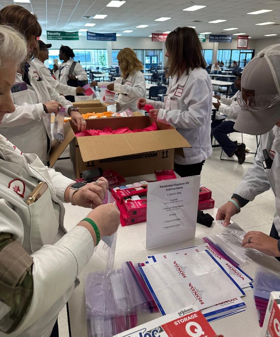 volunteers assembling kits