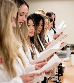Students in white coats