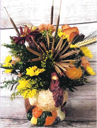 Fall flowers arranged in a beautiful Turkey Vase