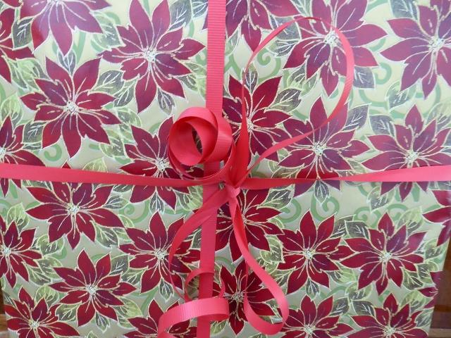 festively wrapped package with red ribbon