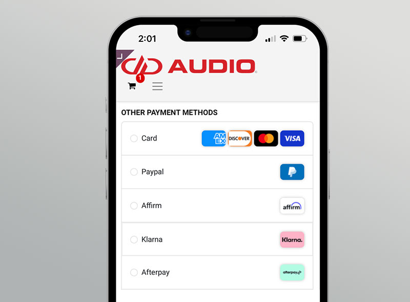 top half of iphone with dd audio web store on screen showing various payment options like card paypal affirm afterpay and klarna
