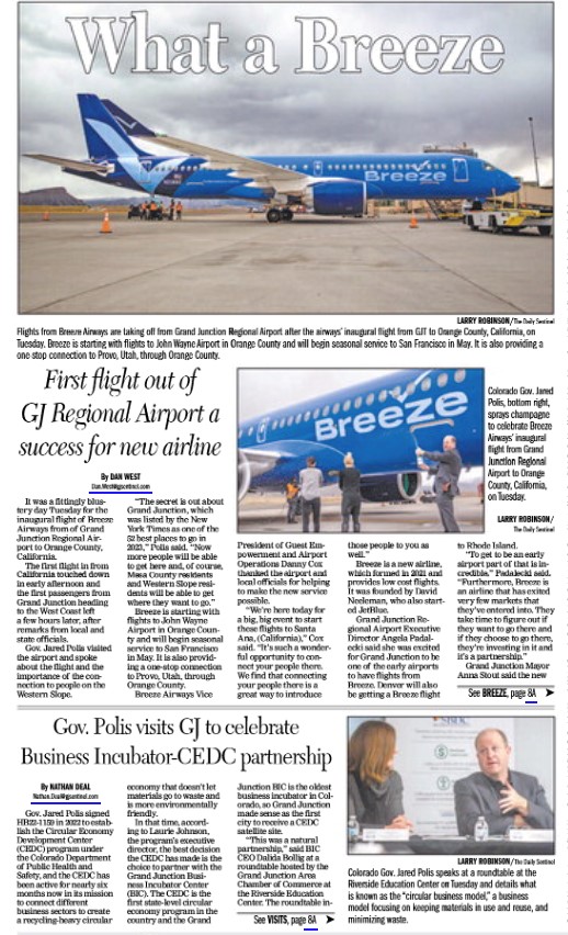 Front page of Grand Junction Sentinel  that shows Governor Polis and a Breeze Airways plane. Below the fold, there is a photo of Governor Polis speaking at the Business Incubator - CEDC partnership  roundtable. 