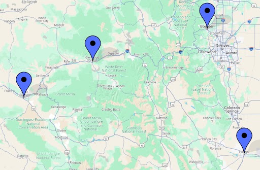 Map of Colorado with pins indicating where Governor Polis has traveled: Boulder, Pueblo, Glenwood Springs and Grand Junction.