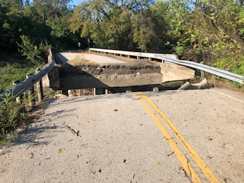 Photo of Duck Creek bridge on Barnes Bridge Road illustrating damage