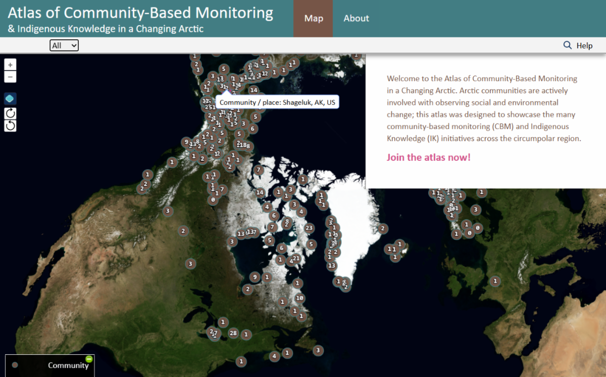 A screenshot of the Atlas of Community-Based Monitoring and Indigenous Knowledge in a Changing Arctic interface. The map shows the Arctic region, including Greenland and surrounding areas, with numerous markers indicating community-based monitoring projects. A sidebar on the right contains descriptive text about the atlas update and collaboration with Inuit Circumpolar Council (ICC) Canada. Navigation tabs labeled “Map” and “About” are visible at the top