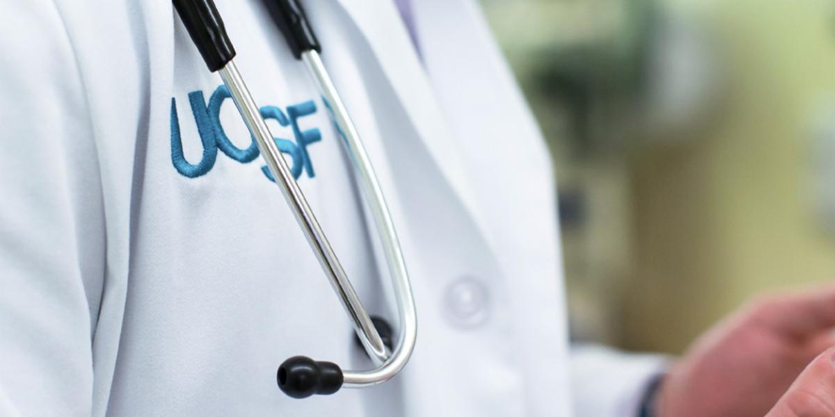 closeup image of doctor with stethescope and UCSF logo on jacket
