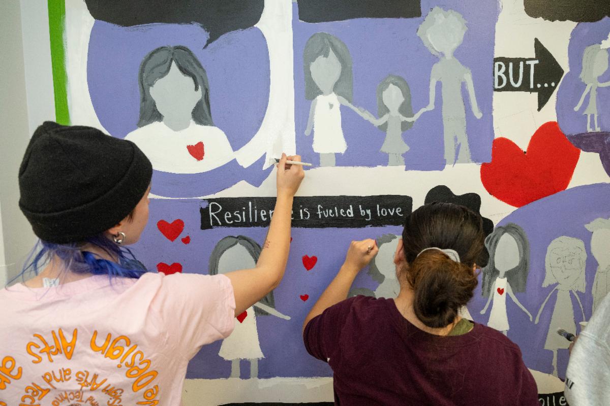 Students paint mural for Grand Challenge course