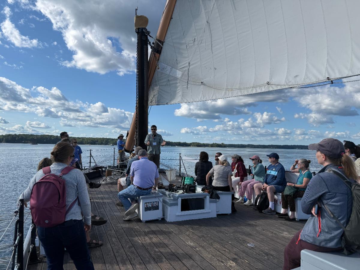 Passengers on a sailboat
