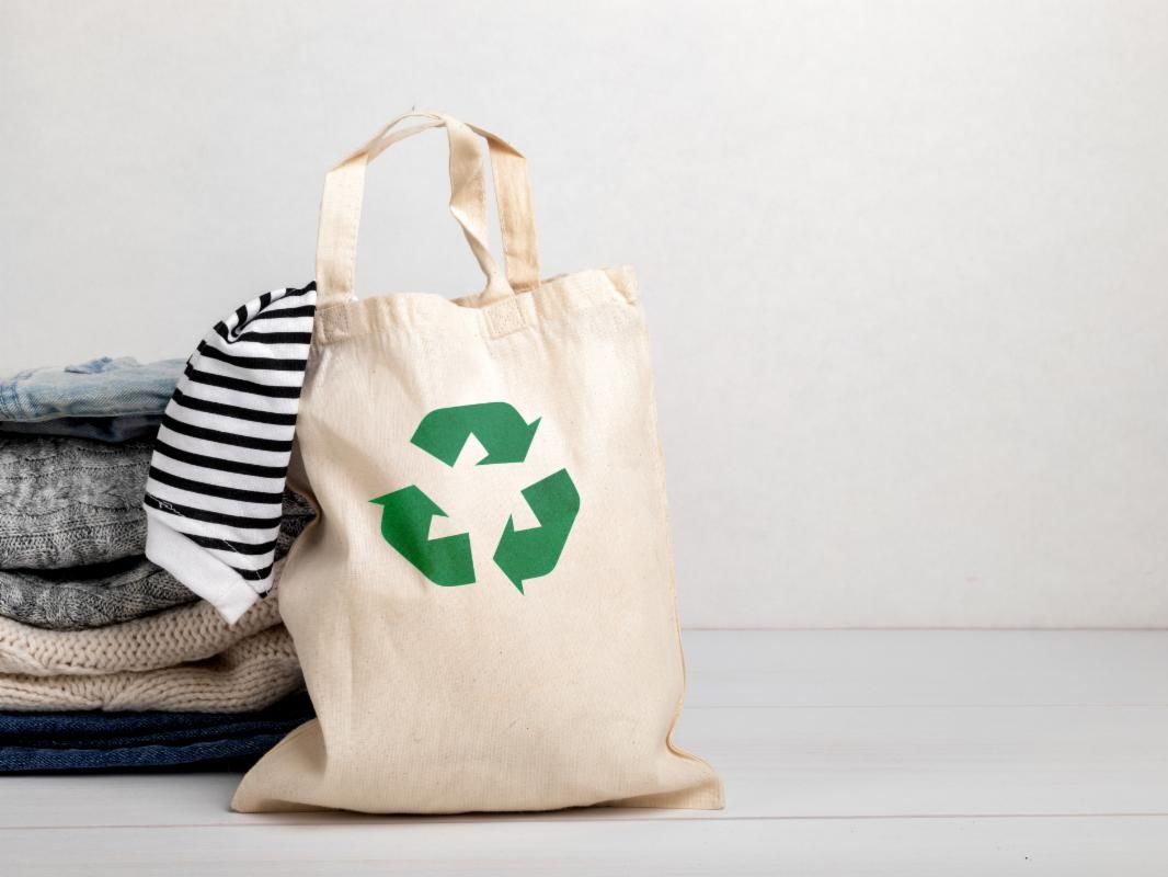 Canvas tote with clothing inside