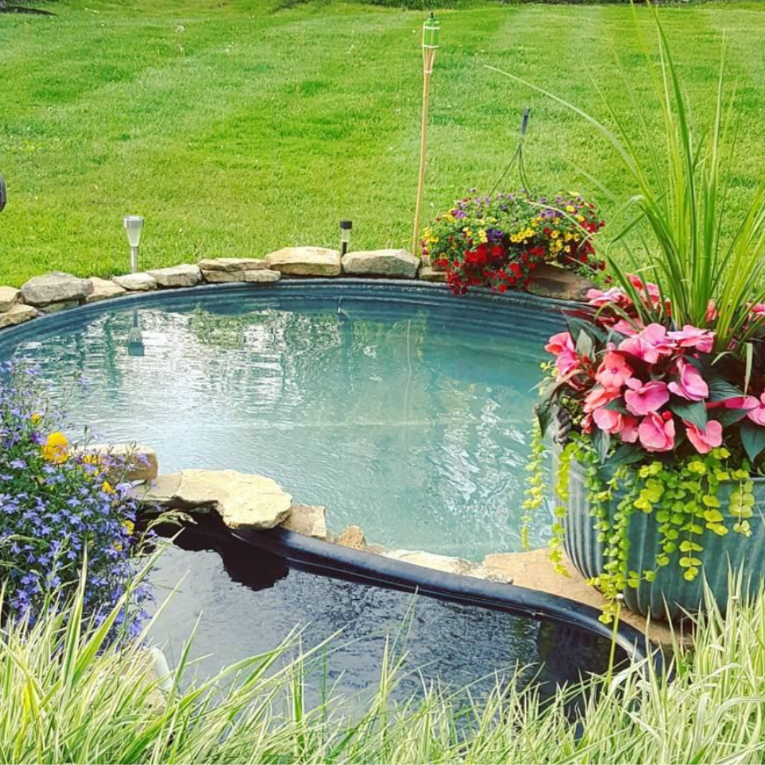 Stock Tank Pool with flowers around it