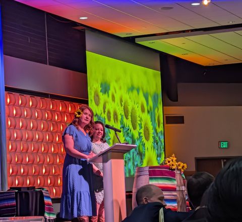 Speakers at the podium during a nonprofit gala
