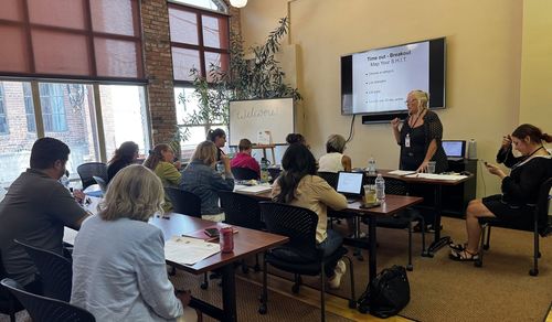 A working session with nonprofit leaders around a table