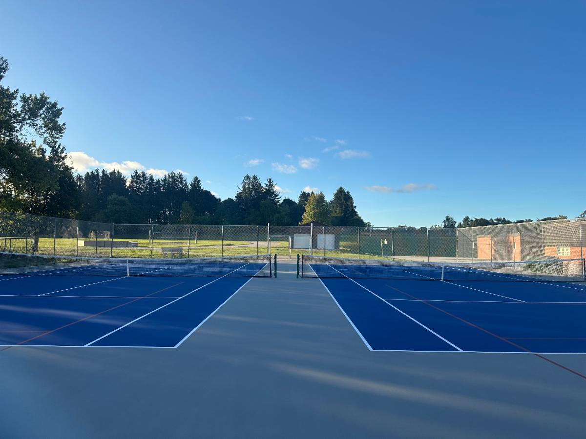 photograph of the recently completed resurfacing of Lion's Head Tennis and Pickleball Courts