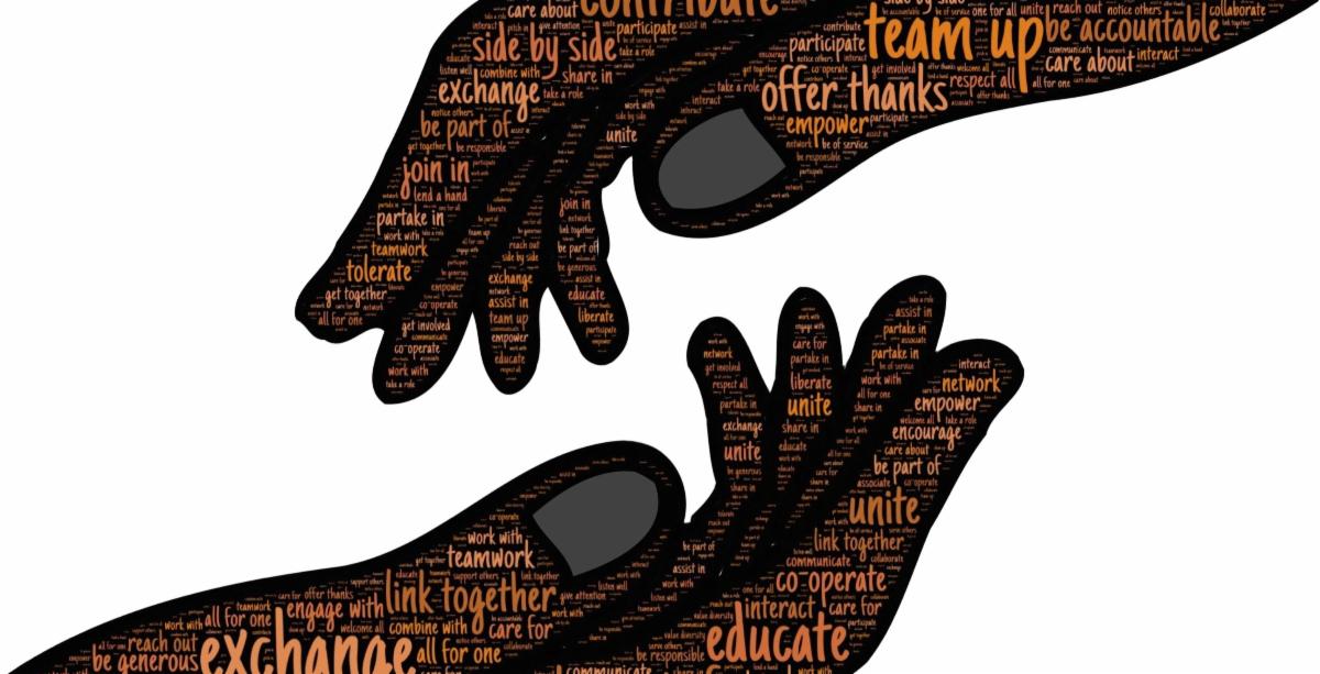 two drawn hands reaching towards each other, with words written on them 